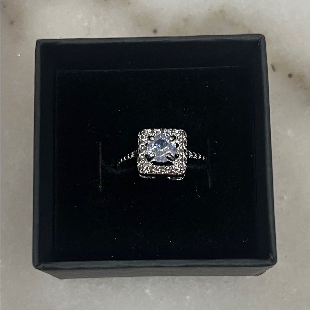 Elegant Silver and Blue Zirconia Ring